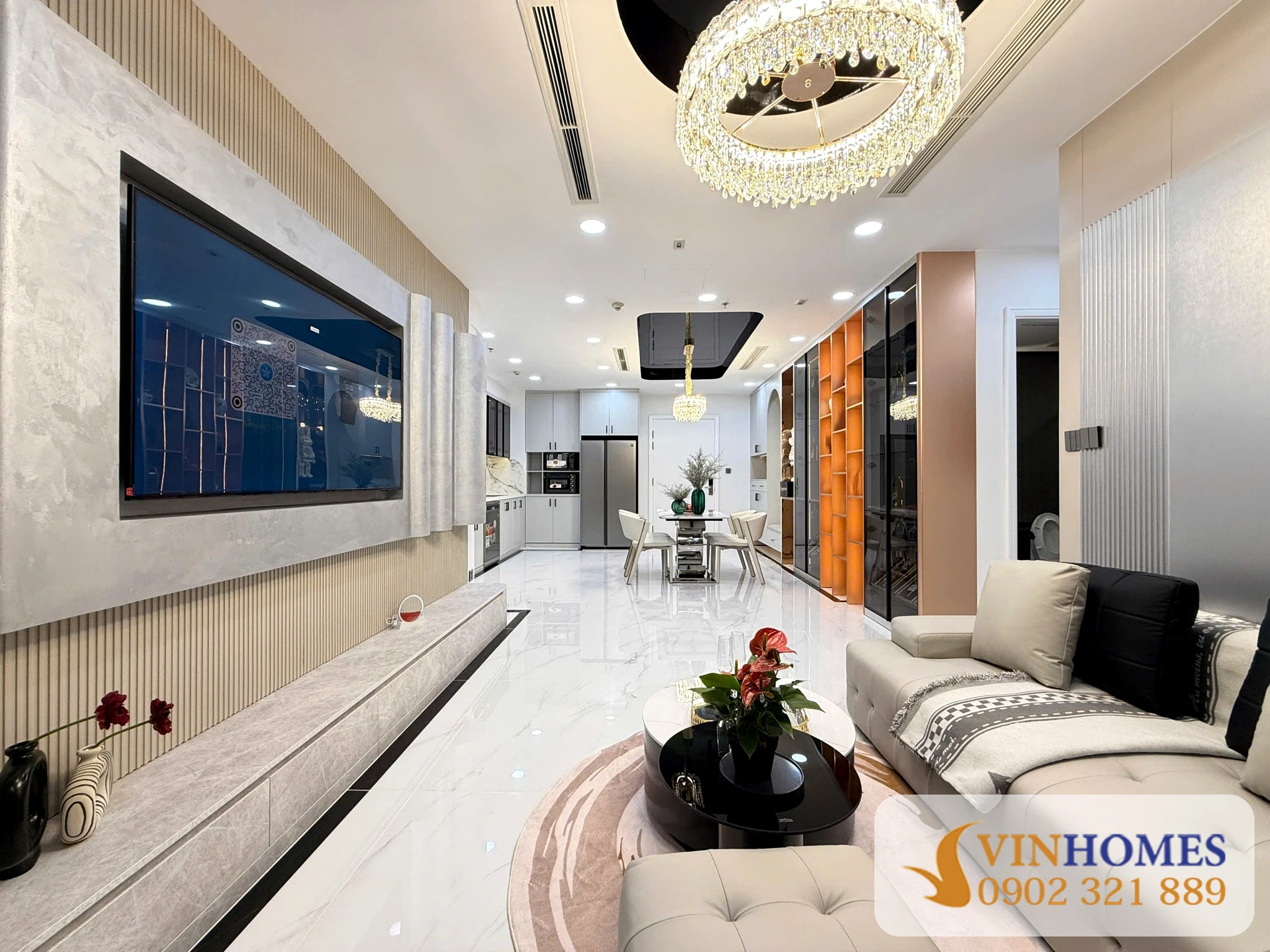 Phòng khách liền bếp căn hộ 2 phòng ngủ Vinhomes Central Park full nội thất, đã có sổ