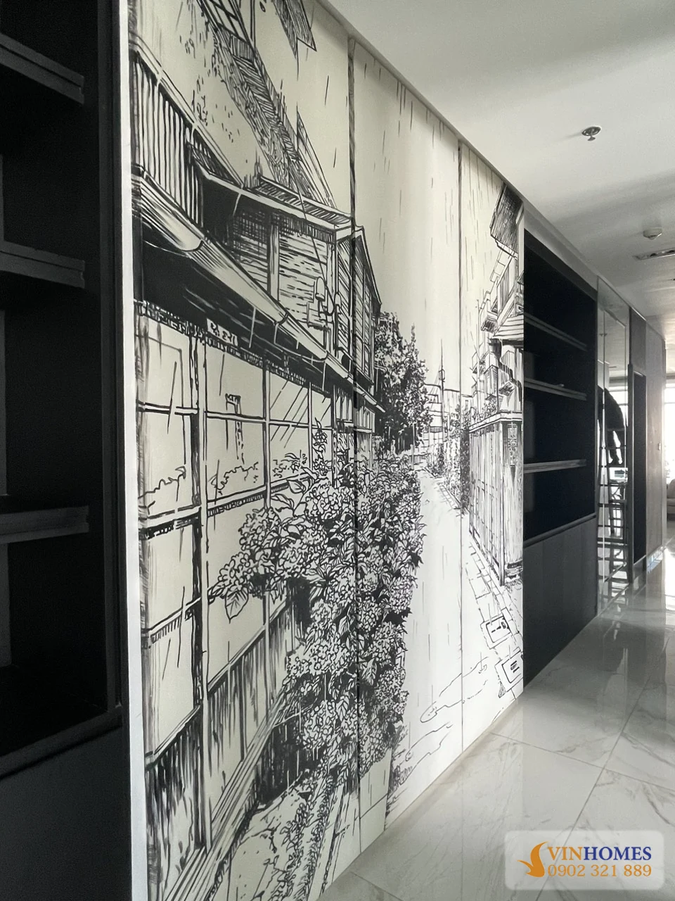 Vách trang trí nghệ thuật màu đen trắng tại hành lang căn hộ Vinhomes Central Park